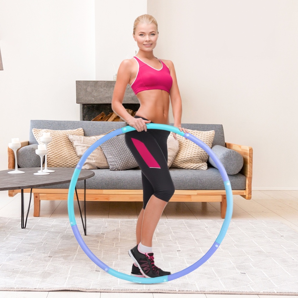 Modell trainiert mit dem AsVIVA Hula-Hoop Reifen HH1 für einen straffen, flachen Bauch