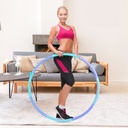 Modell trainiert mit dem AsVIVA Hula-Hoop Reifen HH1 für einen straffen, flachen Bauch